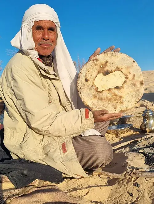 Préparation du pain de sable traditionnel